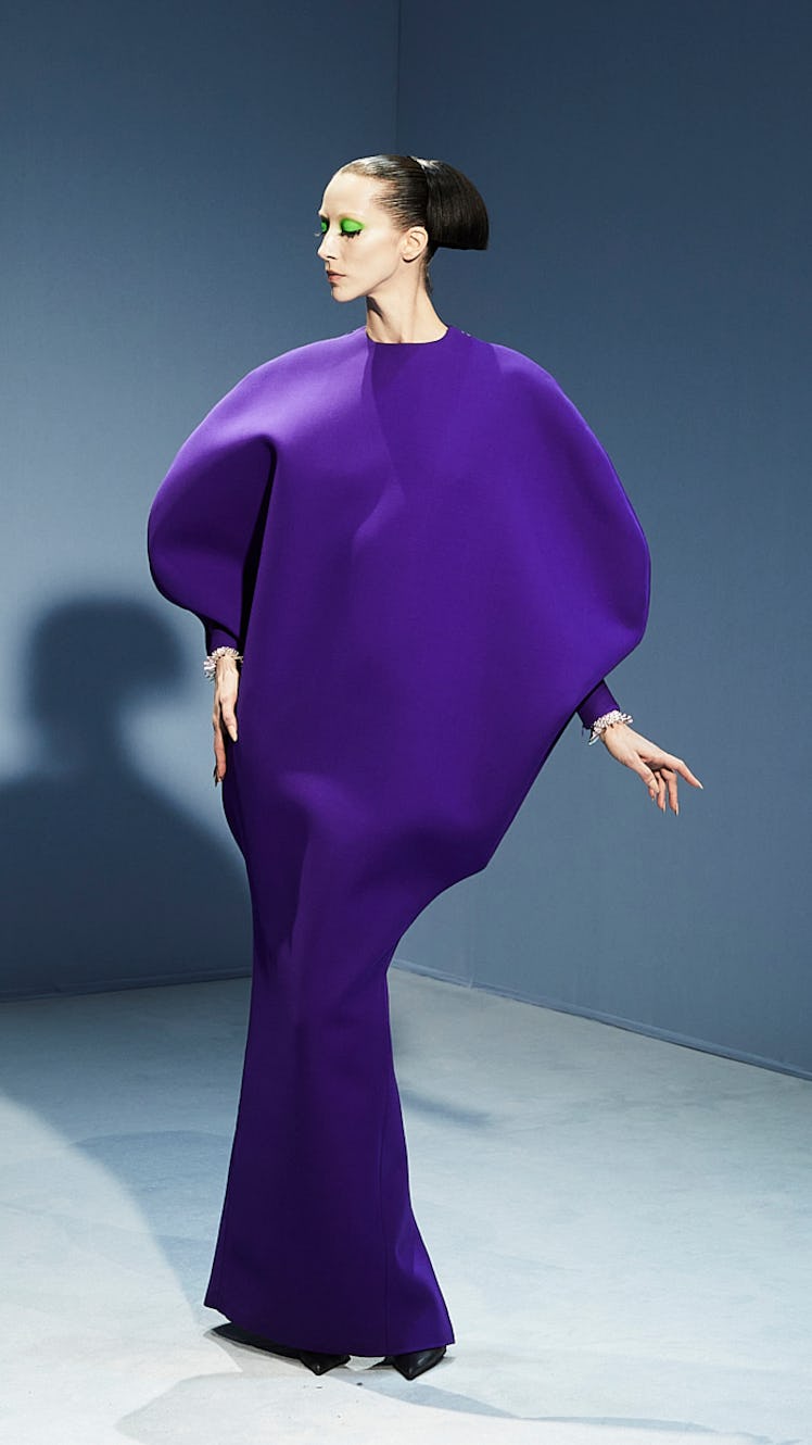 Model in purple dress 