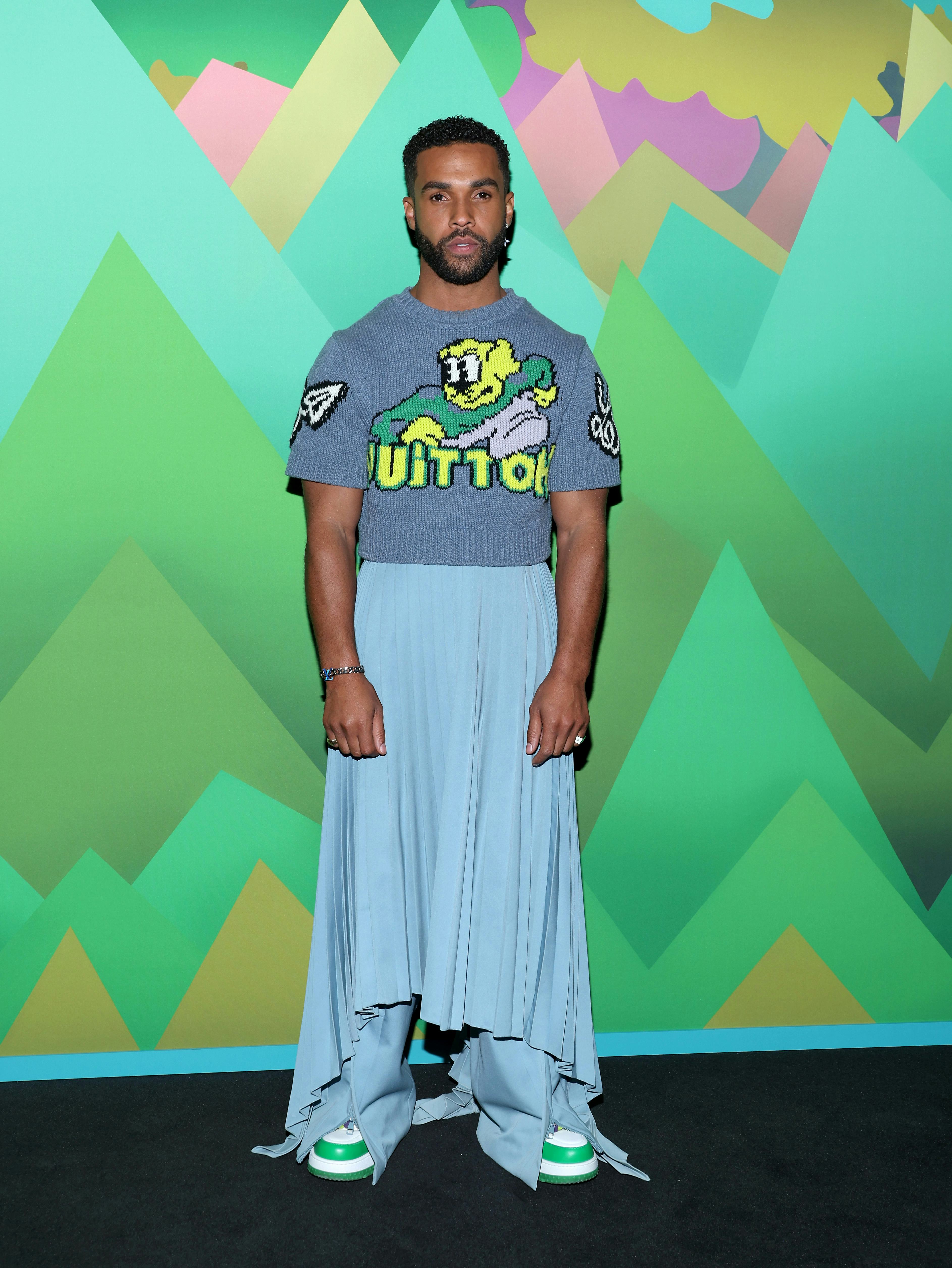 Lucien Laviscount in a Louis Vuitton skirt