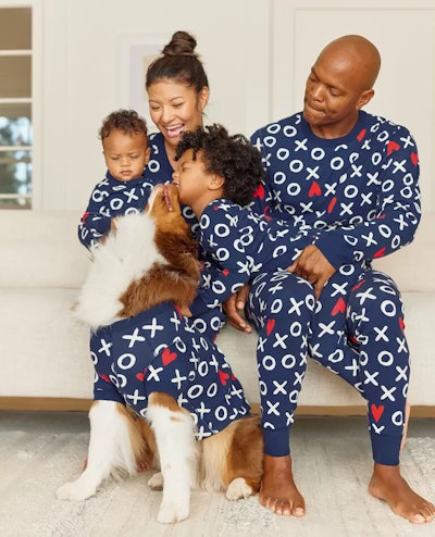 Family in matching Valentine's Day pajamas