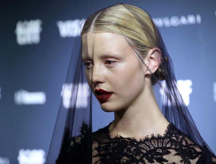 Mia Goth in veil.