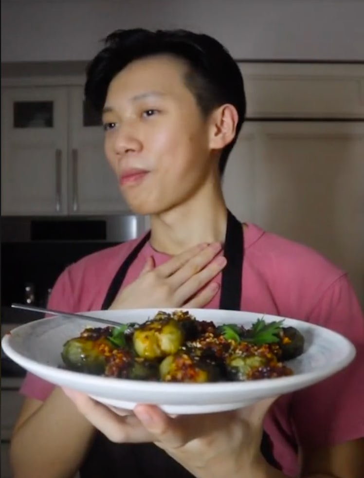 A TikToker shows a smashed Brussels sprouts recipe with chili oil.