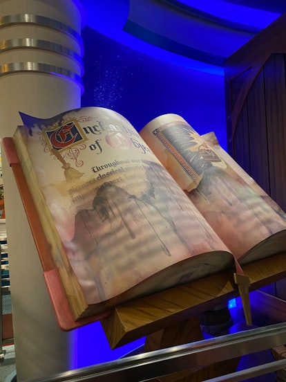 The Mickey Minnie Runaway Railway easter eggs include a 'Sorcerer's Apprentice' hat and book.