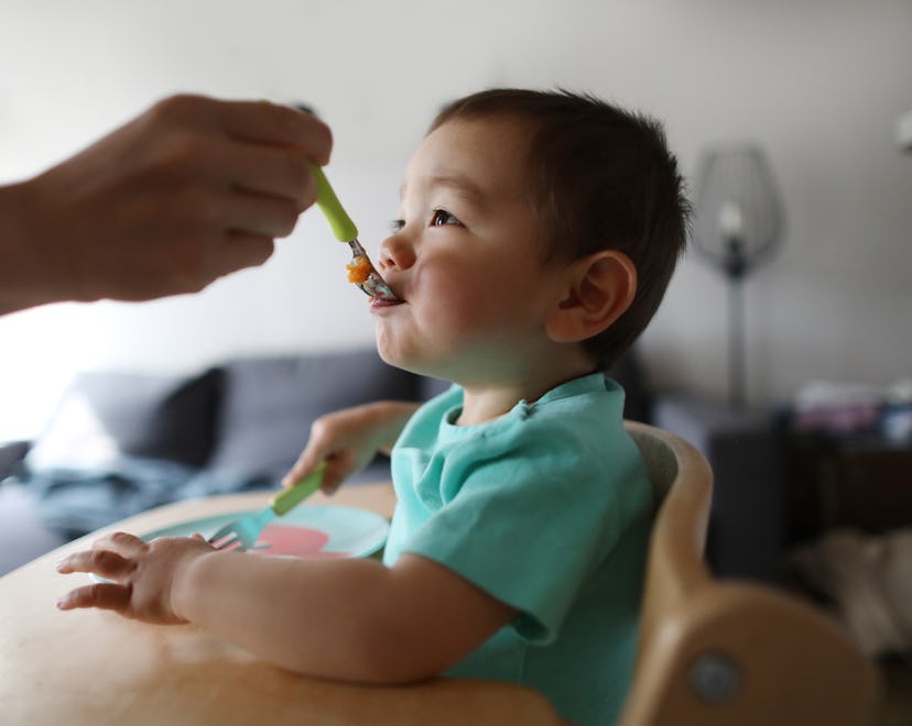 FDA Announces Action To Reduce Lead Levels In Baby Food; baby being fed
