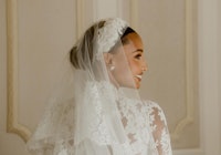 Jasmine Tookes wedding hair bun with headband and veil