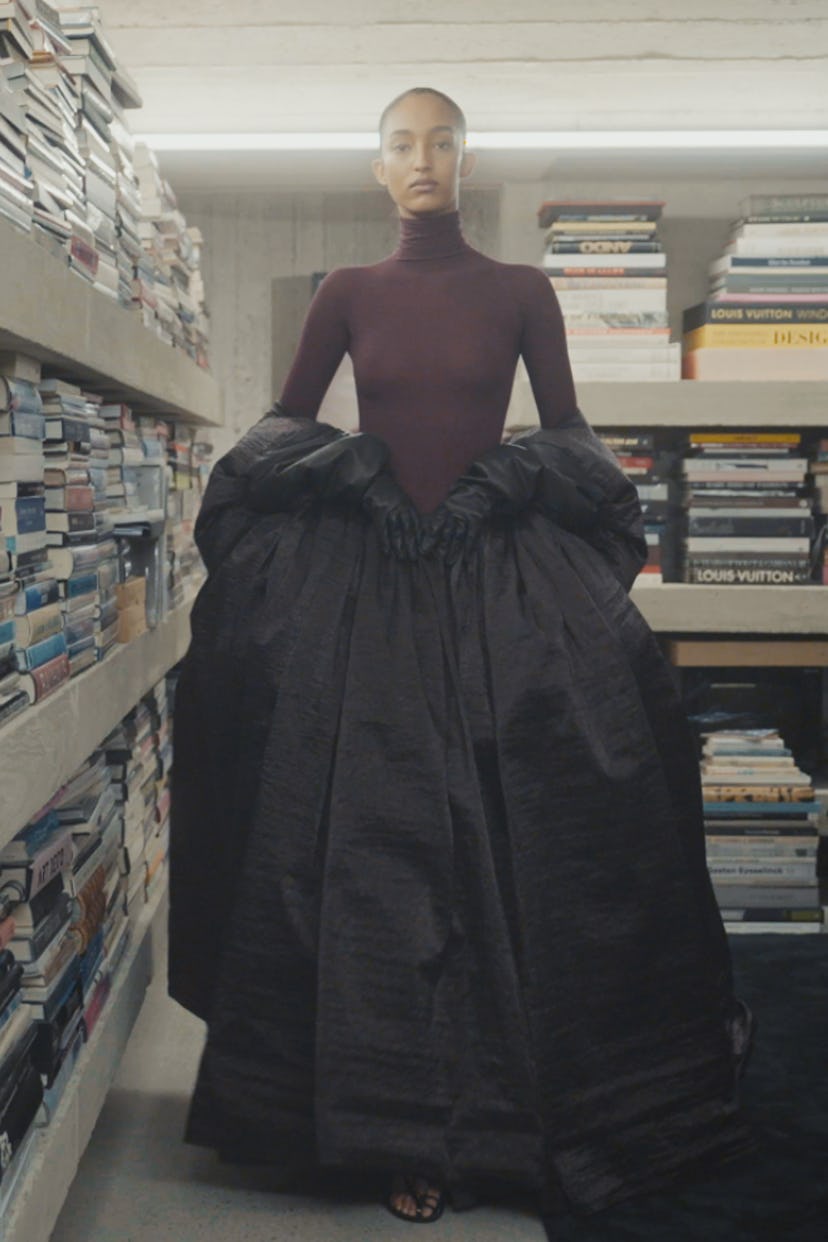 A model walks the Alaïa runway which took place in designer Pieter Mulier's own home