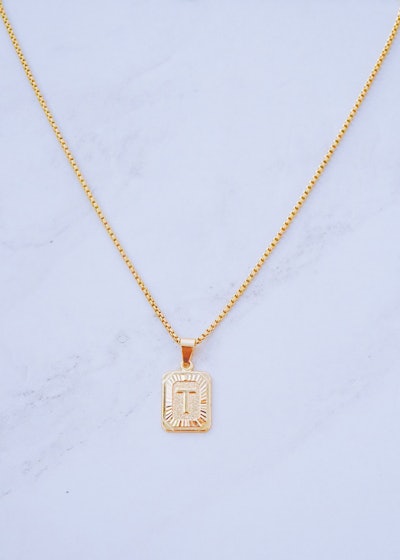 Gold initial necklace with pendant, a perfect valentines day gift for new moms