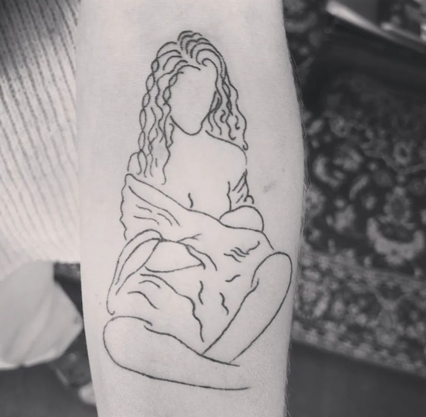 One breastfeeding tattoo idea to consider is an abstract outline of your full body while nursing.
