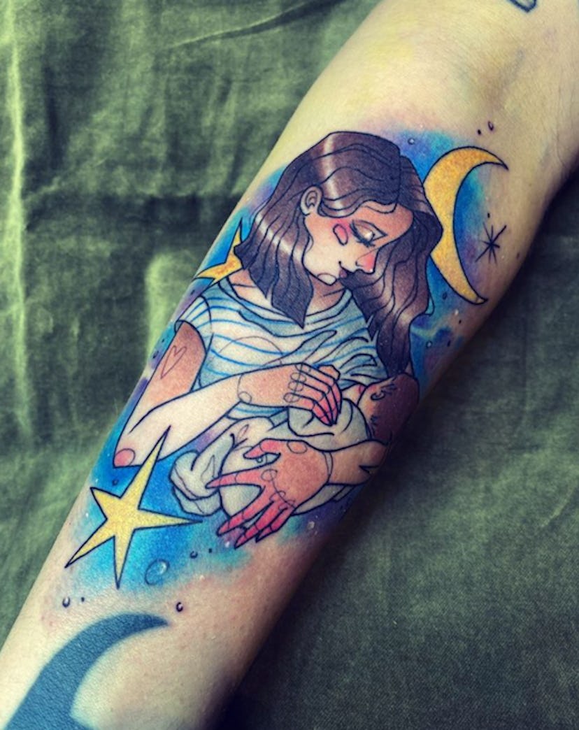 A whimsical re-imagining of a feeding session is one breastfeeding tattoo idea to consider.