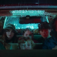 The Gladney family sits in a car together in White Noise