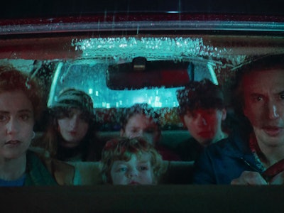 The Gladney family sits in a car together in White Noise