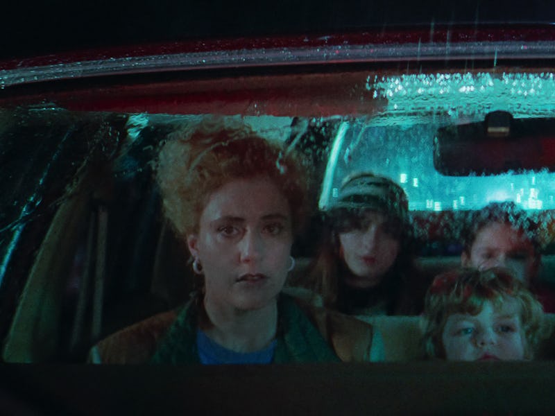 The Gladney family sits in a car together in White Noise