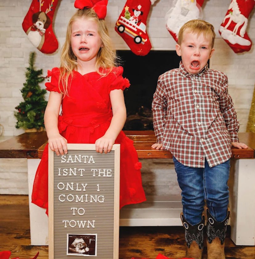 holiday photo of two kids who are crying for a funny pregnancy announcement 