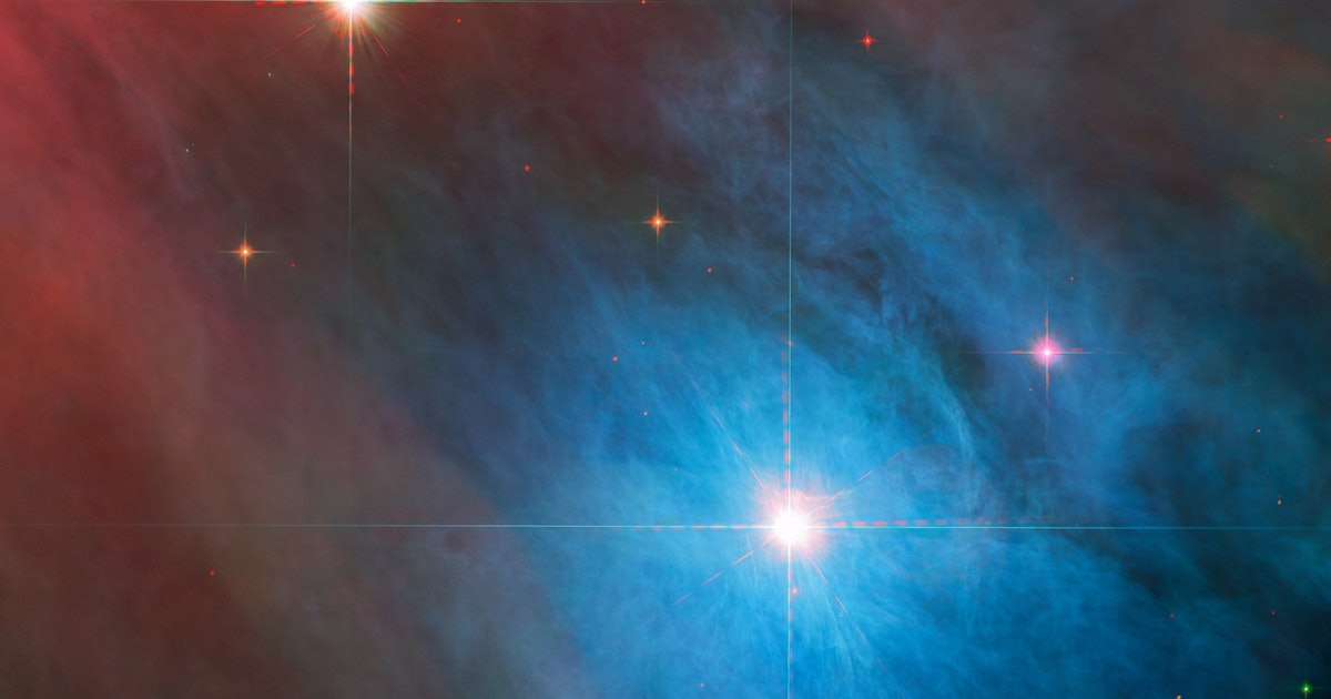 Questa immagine di Hubble della NASA mostra luci scintillanti che brillano attraverso il gas Technicolor