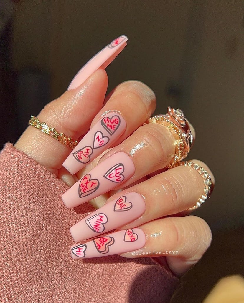 These candy-inspired square acrylic nails are a cute pink & red nail design for Valentine's Day 2023...