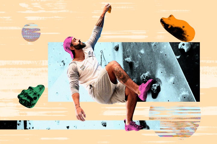 A man doing a wall climbing workout in order to do a full body workout