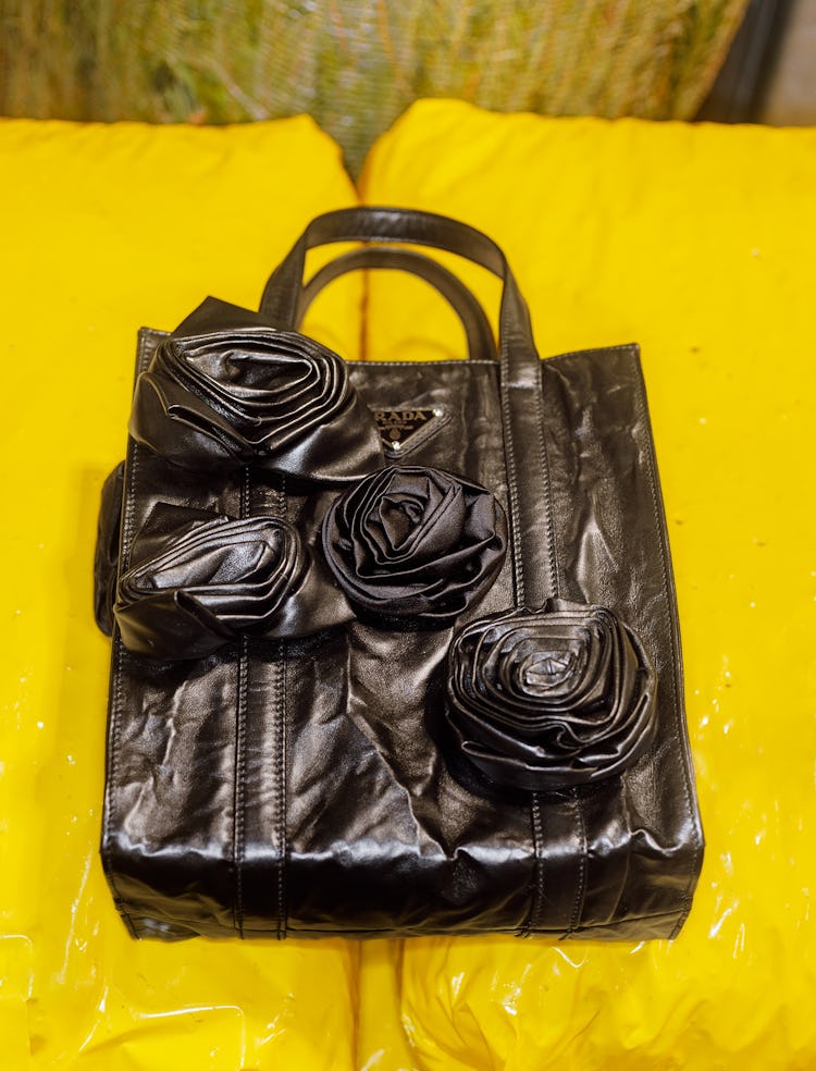 Prada black leather tote bag.