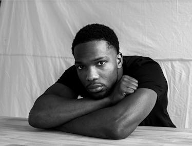 A black and white portrait of actor Tosin Cole