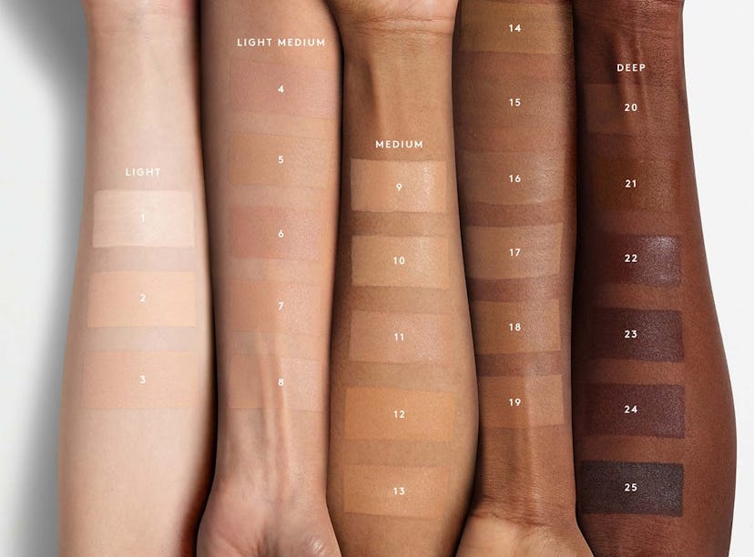 Models swatching Fenty Beauty's Eaze Drop Blurring Skin Tint