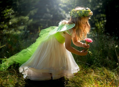 A toddler dressed as a fairy. Fairy names are a little used option for parents looking for a baby na...