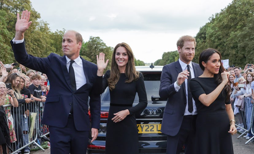 Prince William and wife Kate, and Prince Harry and wife Megan wave at UK citizens at a parade