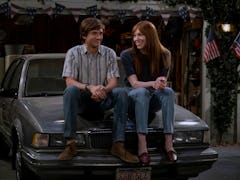 Topher Grace as Eric Forman, Laura Prepon as Donna Pinciotti in That ‘90s Show