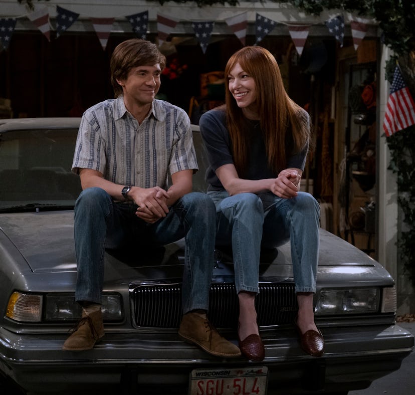 Topher Grace as Eric Forman, Laura Prepon as Donna Pinciotti in That ‘90s Show