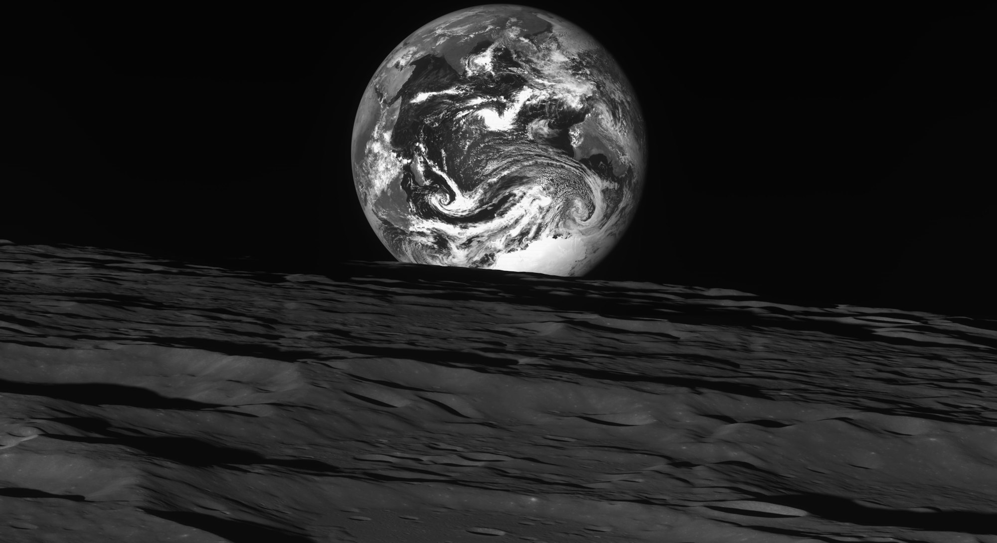 The Earth, appearing as a black and white marble with streaks of clouds across its atmosphere, peeks...