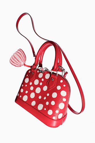 a red and white polka dot bag from louis vuitton x yayoi kusama