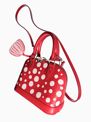 a red and white polka dot bag from louis vuitton x yayoi kusama