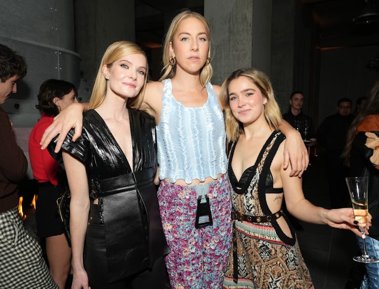 Meghann Fahy, Este Haim, and Haley Lu Richardson attend Louis Vuitton and W Magazine's awards season...