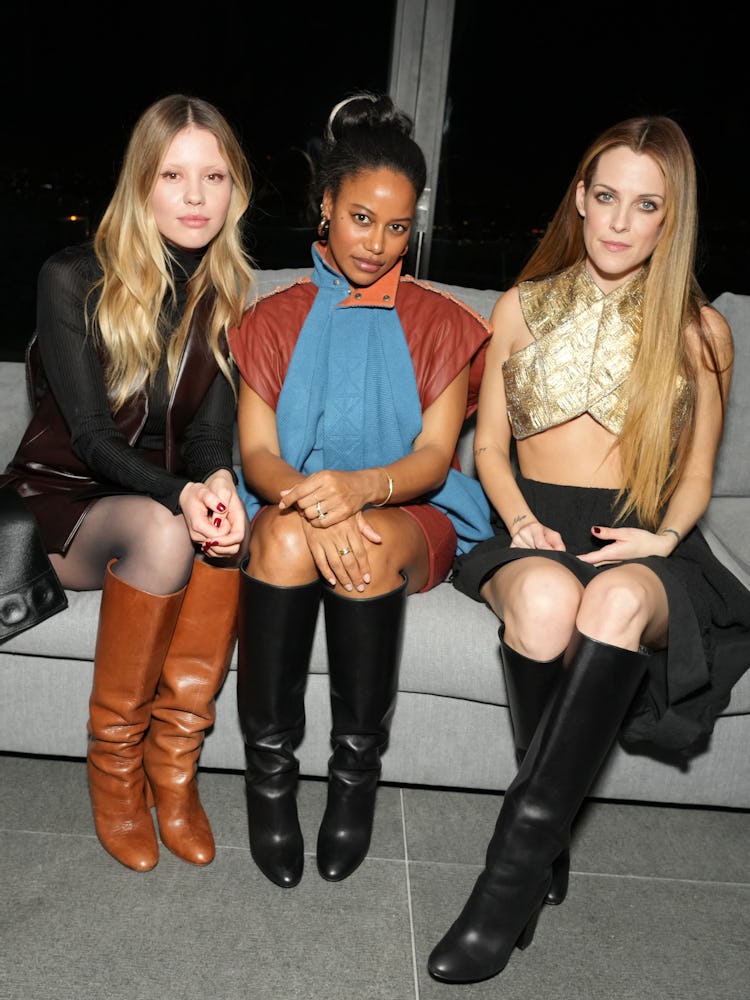 Mia Goth, Taylour Paige, and Riley Keough attend Louis Vuitton and W Magazine's awards season dinner...
