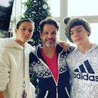 Louis van Amstel stands between his two sons. The 'Dancing with the Stars' pro opened up about he an...
