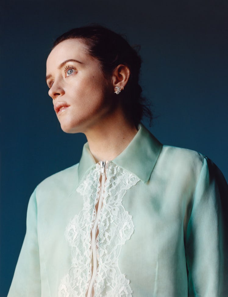 Claire Foy wears a Christopher Kane jacket; Cartier earrings.