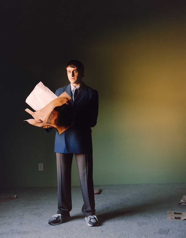 Paul Mescal wears a Fendi jacket, shirt, and pants; Charvet tie; New Balance sneakers.