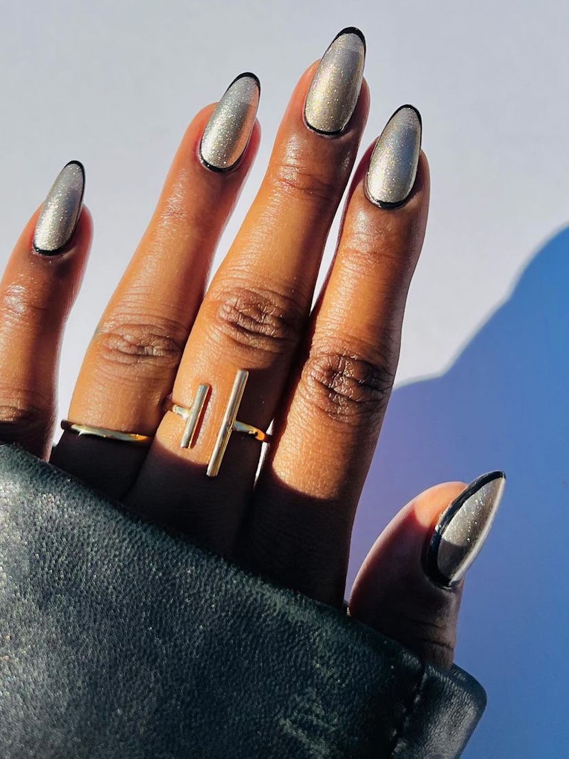 One of fall 2023’s most popular nail polish color trends is silver chrome.