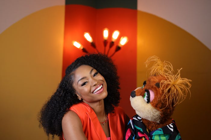 Megan Piphus and one of her puppet characters.