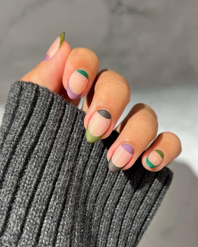 If you need manicure inspo, half-moon nail art is a simple nail design for short nails that's on-tre...