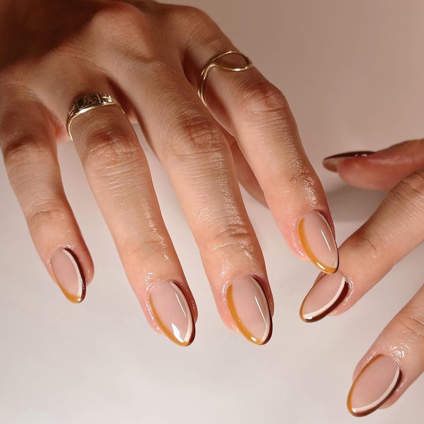 If you need manicure inspo, here is a simple fall 2023 nail design for short nails.