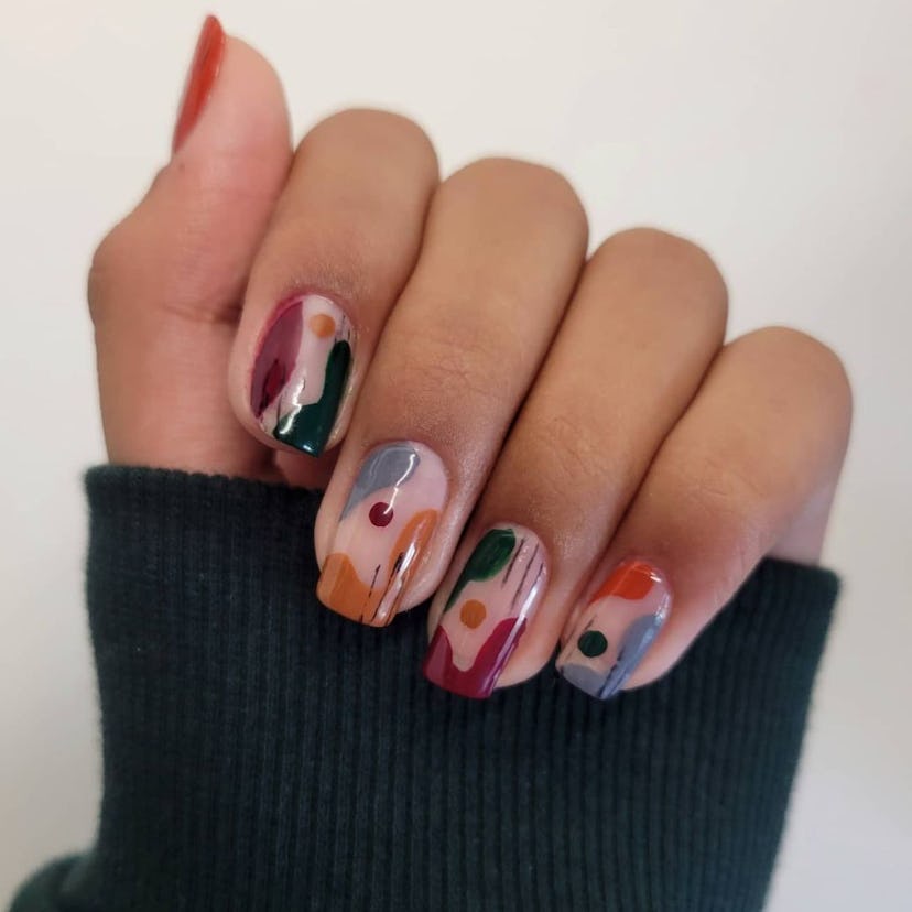 If you need manicure inspo, abstract nail art is a simple nail design for short nails that's on-tren...