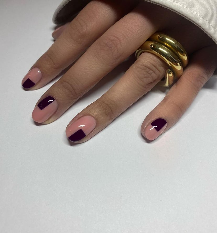 A simple nail art design for short nails with checkerboard nail art.