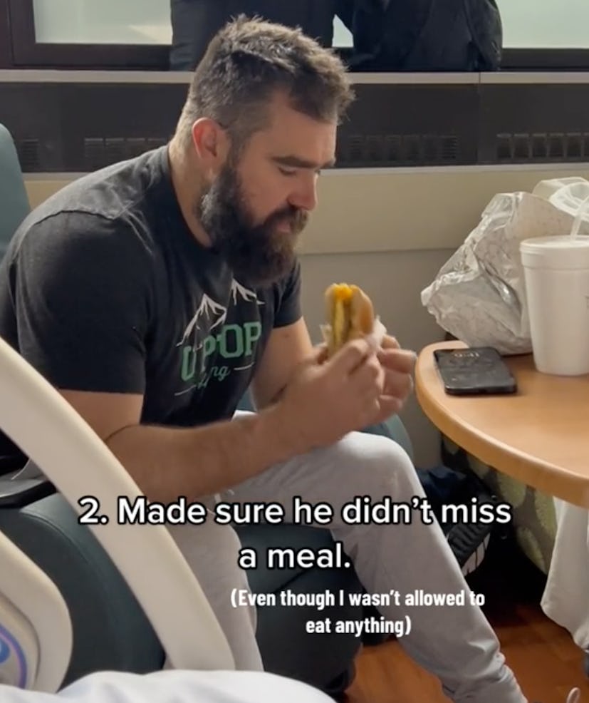 Jason Kelce eating a sandwich while his wife is in labor