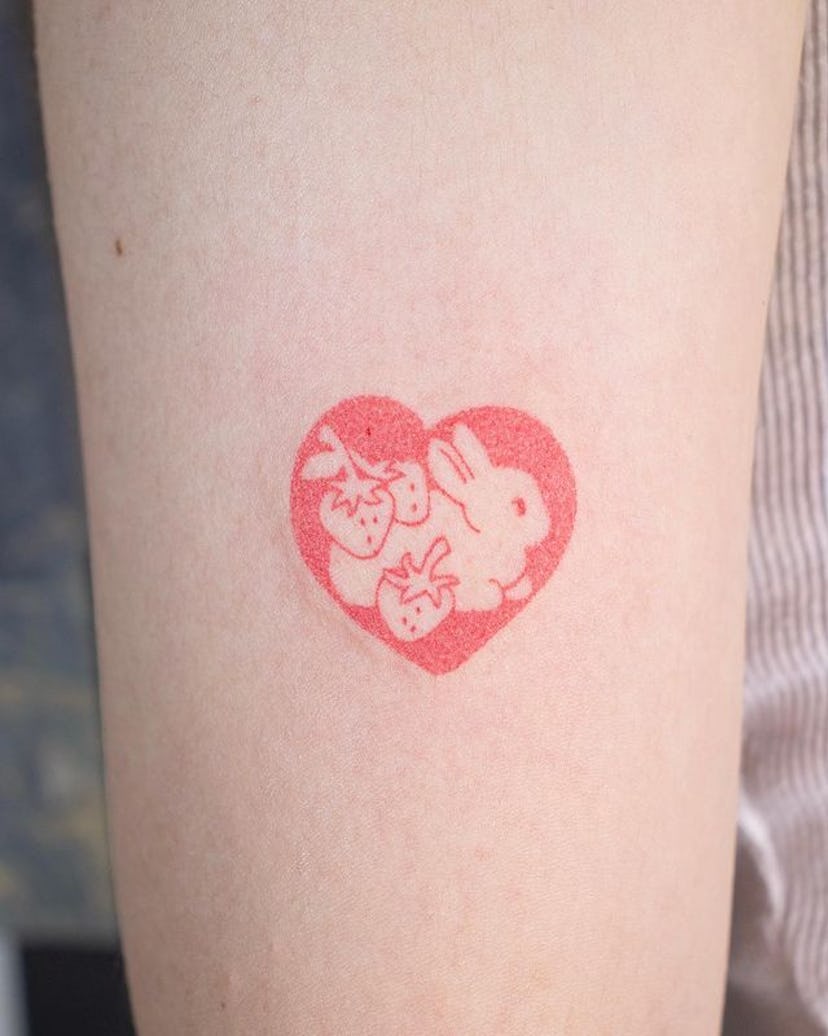 Red ink animal tattoos.