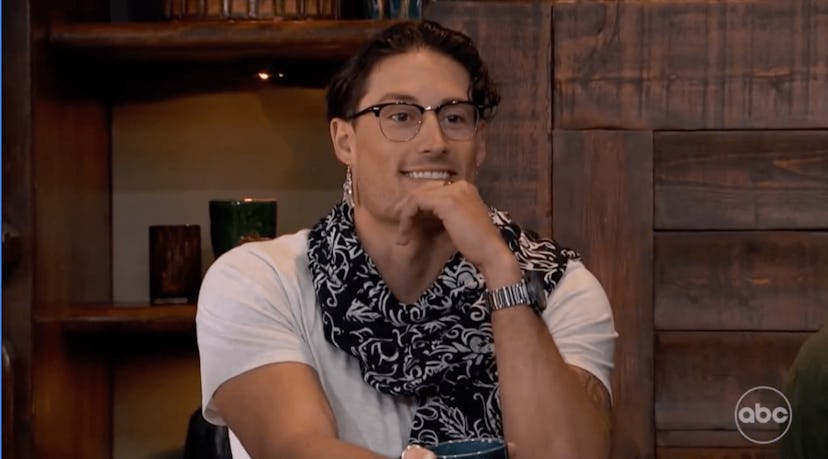 Brayden on The Bachelorette in a patterned scarf and earrings