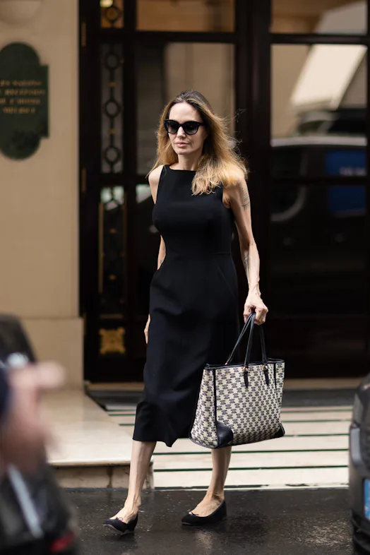Angelina Jolie Styled A Knit LBD In Between Takes For Her New Movie Angelina Jolie Styled A Knit LBD In Between Takes For Her New Movie