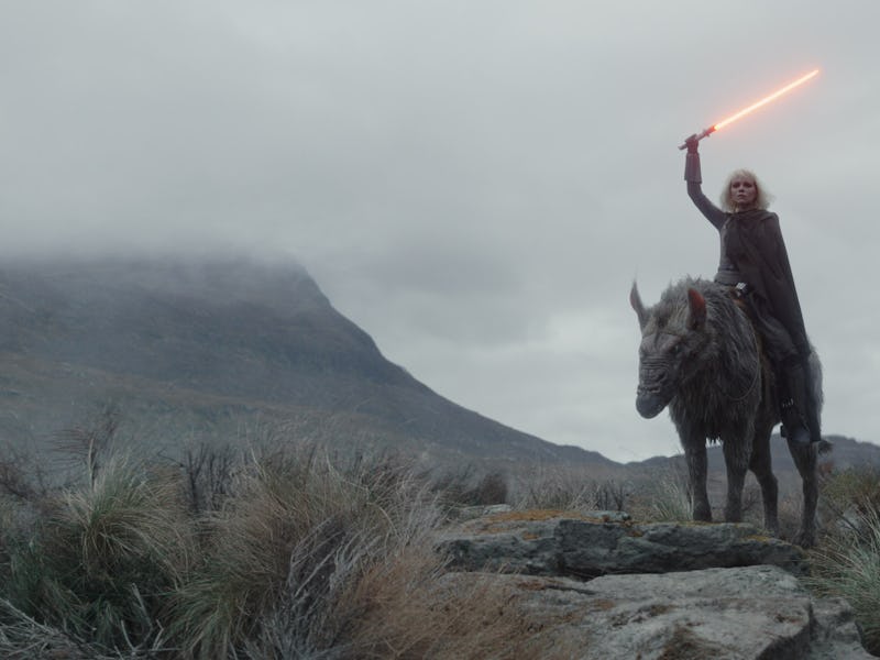 Shin in the 'Ahsoka' finale holding her red-orange lightsaber.