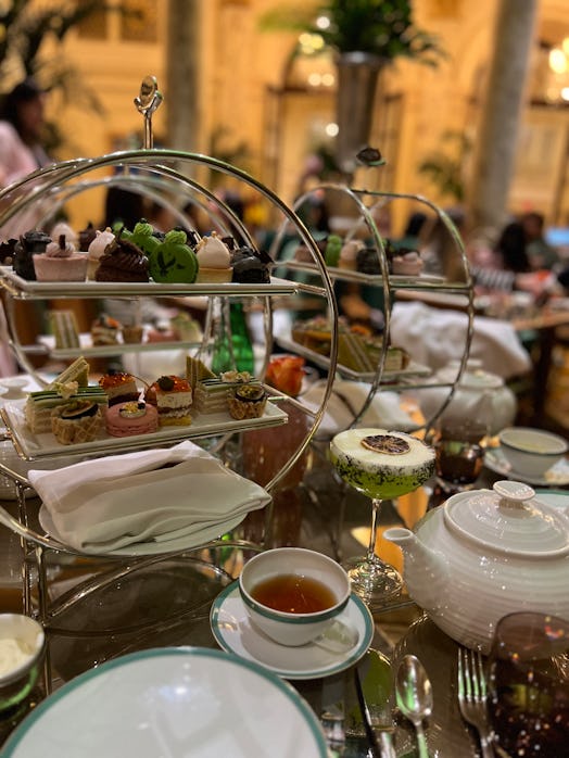 The 'Wicked' Signature Tea service at the Plaza Hotel in NYC, featuring the Witches Brew cocktail.