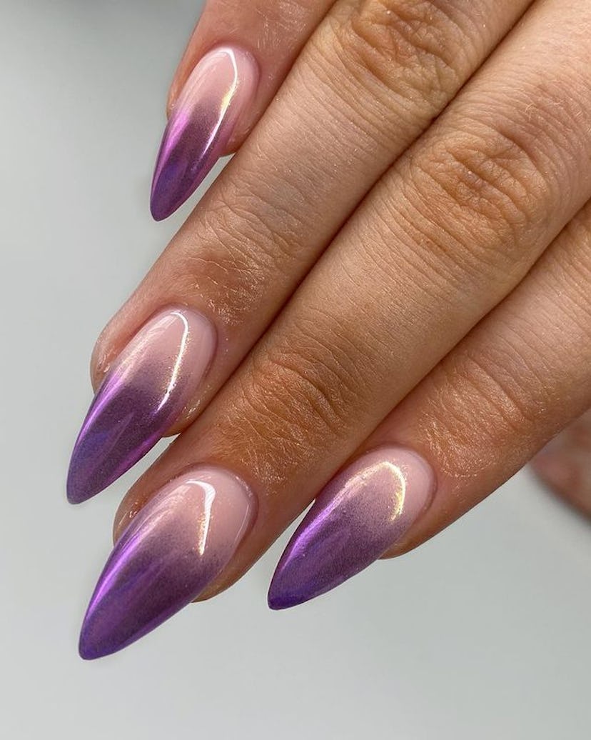 Purple chrome nails.