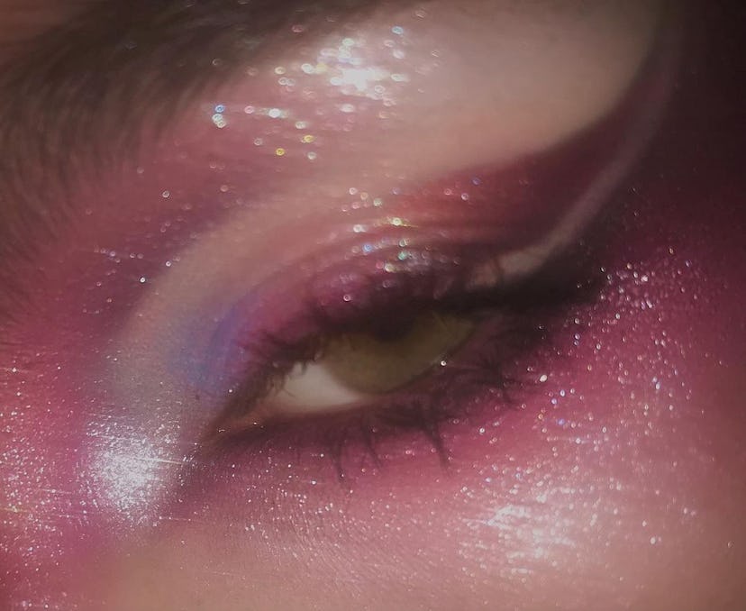 If you need a Barbie makeup idea for Halloween 2023, try hot pink glitter eye makeup.