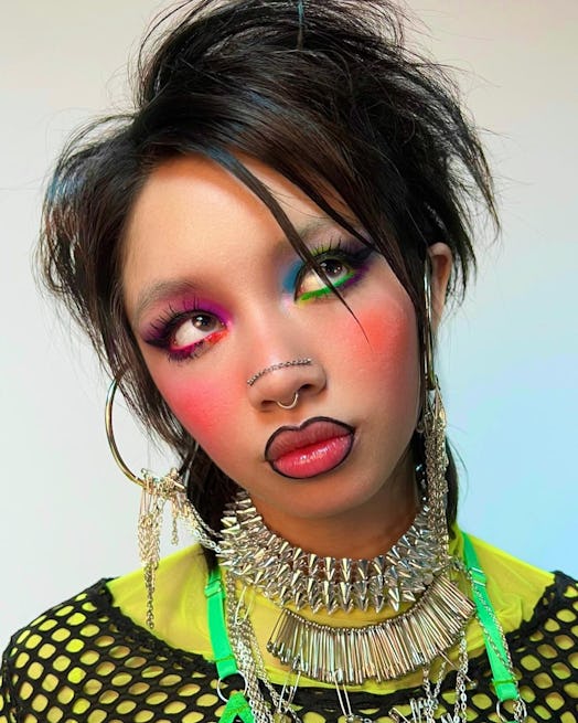 If you need a creative Barbie makeup idea for Halloween 2023, this rainbow look is perfect for a "We...