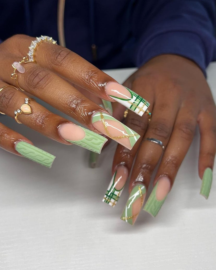 If you need a winter manicure design idea for 2023, these textured green sweater nails are on-trend.